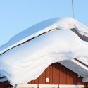 Is Winter-Related Roofing Damage Covered by Homeowners Insurance?